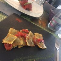 Ravioli stuffed with spinach and aubergine cream and vegetable balls at Cavoli Nostri in Naples