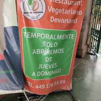 Sign at the doorway in August. 2026 at Devanand in Aguascalientes