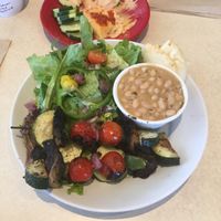 veggie kabobs, salad, and white bean w/rosemary  at Zoës Kitchen in Gainesville