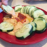 red pepper hummus with cucumbers at Zoës Kitchen in Gainesville
