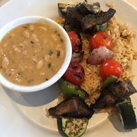 veggie kabobs on rice pilaf with white bean a w/ rosemary  at Zoës Kitchen in Gainesville