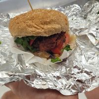 The burger got squashed in my bag but it was SO GOOD at The V Factor in Lanzarote