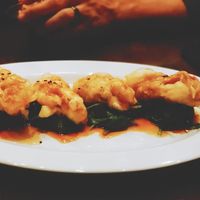 Crispy king oyster mushroom glazed w. sesame soy au jus at Herban Fix Vegan Kitchen in Atlanta