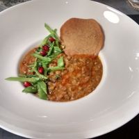 Five-lentil Panchratna dal, leaves and snow peas,
Kari Gosse and herb infused oil, papadum at La Table des Roy in Nantes