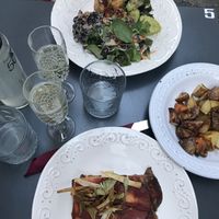 buddha bowl, baked potatoes and parmiggiana at Botanica Lab in Bologna