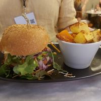 Beyond Burger...there is a burger under that lettuce I promise! My partner started taking the tomatoes out! at Botanica Lab in Bologna