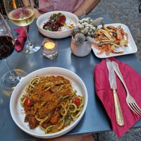 Tomato roll, pasta and fried veggies as a side at Botanica Lab in Bologna