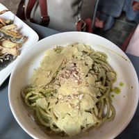 Pici al pesto di mandorle e cavolo nero con scaglie di parmigiano vegano   at Botanica Lab in Bologna