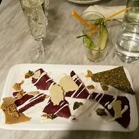 two main courses - tortellini and raw beetrot ravioli at Botanica Lab in Bologna