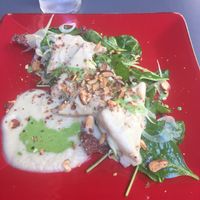 Tempeh with jerusalem artichoke cream and nuts at Botanica Lab in Bologna