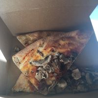Vegan pizza leftovers with sun dried tomatoes added at American Flatbread in Canton