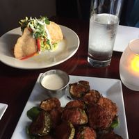 Special empanadas and fried pickles at Blossom Restaurant Chelsea in New York City