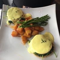 tofu Florentine with rosemary potatoes and asparagus  at Blossom Restaurant Chelsea in New York City