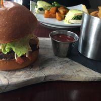 soy bacon cheeseburger burger and fries at Blossom Restaurant Chelsea in New York City