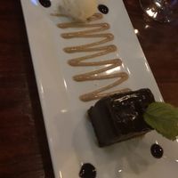 Ganache with PB drizzle and vanilla ice cream at Blossom Restaurant Chelsea in New York City