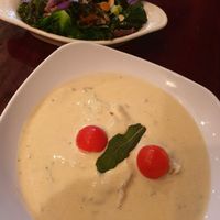 Ravioli with a side of kale, squash and almonds at Blossom Restaurant Chelsea in New York City
