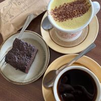 Cheese, brownie, turmeric latte and long black  at MOA Bakery Cakery in Oamaru