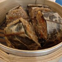 Lotus leaf sticky rice. Soft sticky rice with mushrooms and mock meat, wrapped in lotus leaf. Very good. at Nature's Recipe Cafe in Petaling Jaya