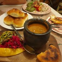 Bean pot, corn bread, regular bread and vegan pate plate at Palaty in Kutaisi