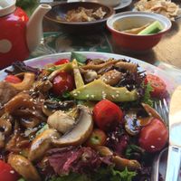Mushroom salad and soup and hummus in the background  at Kafe Leila in Tbilisi