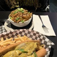 Philly cheezesteak sandwich and Mac N Cheeze with extra seitan.   at Black Water Bar in Portland