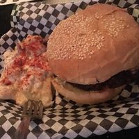Peanut butter and tempeh bacon burger with potatoe salad at Black Water Bar in Portland