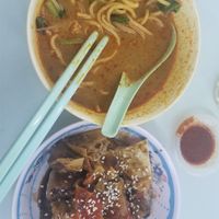 Laksa and assorted pieces at Blue Boy Vegetarian Food Centre in Kuala Lumpur