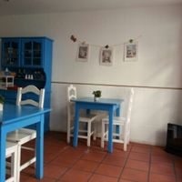 table at ground floor at Didi Cafe in Albufeira