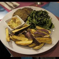 Vegetable burger with sweet potato fries  at Didi Cafe in Albufeira