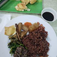 My plate, plus fried tofu served after I sat (was a surprise) at Tu Hao in Hanoi