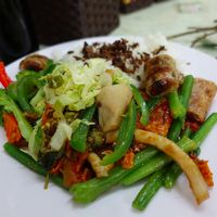 Heaps of vegetables with white and red rice at Tu Hao in Hanoi