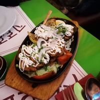 Potatoes with vegan cheese and mayo at Veg World India in Barcelona