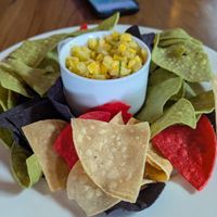 Chips and Dip- Tortilla chips with choice of vegan house cashew cheese
sauce, pico de gallo, or mango salsa at Firefly in Charlottesville