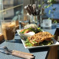 Avo sandwich and oat latte   at Open New Doors in Gothenburg