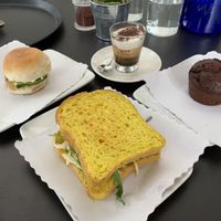 Delicious sandwiches, chocolate muffin and espresso! at 100% Bio in Rome