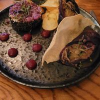 Red cabbage stuffed with shitake mushrooms and potatoes, warm lentil salad, Marsala sauce at Herzenslust in Saarbrucken