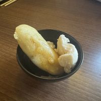 Banana fritter with vegan vanilla ice cream  at Peaches Restaurant in Newcastle-under-lyme