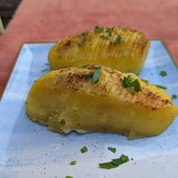 Oven-roasted potatoes with nutmeg at Aubergine in Bucharest