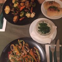 Vegetable stir fry with basmati rice, honey roasted veggies and roasted potatoes at Aubergine in Bucharest