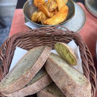 Wedges fries and bread   at Aubergine in Bucharest