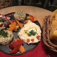 250g vegan mix platter with a side of delicious bread  at Aubergine in Bucharest