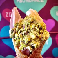 Strawberry, peach, pistachios w/ vegan cone✨delicious!  at Yoga-urt in Glendale