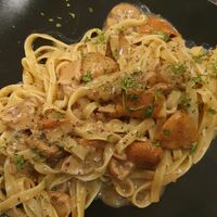 Fettuccine con funghi porcini freschi e crema al tartufo at Ma va' in Rome