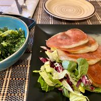 Vegetable side and homemade seitan dish at Ma va' in Rome