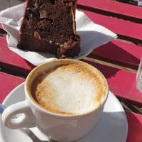 Decaffeinated cappuccino and cake for breakfast at Breaking Bread Bistrot in Rome