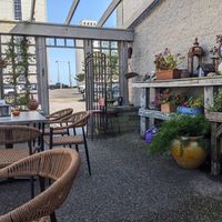 Their beautiful patio area next to the parking lot at The Green Cat in Virginia Beach