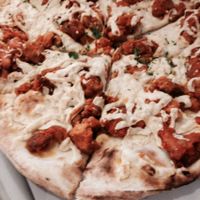 Buffalo Seitan Pizza at 3 Brothers Vegan Cafe in Copiague