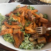 Kale Caesar salad with an add of Buffalo Satan! Huge, stuffed and took half home. Yum at 3 Brothers Vegan Cafe in Copiague