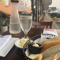 Bread before with Daya butter. One table out front was good for me and my dog.  at 3 Brothers Vegan Cafe in Copiague