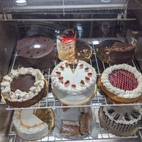 Cake display case at 3 Brothers Vegan Cafe in Copiague